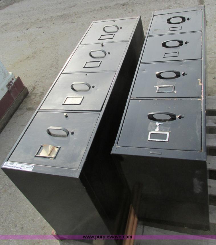 image for item V9061 (2) four drawer vertical file cabinets