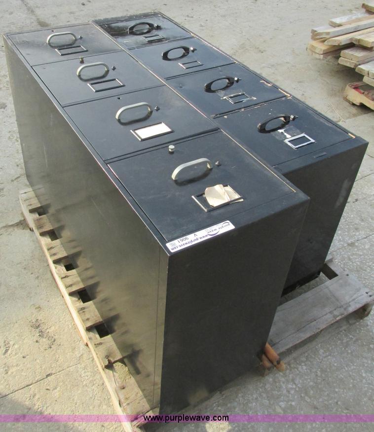 image for item V9061 (2) four drawer vertical file cabinets