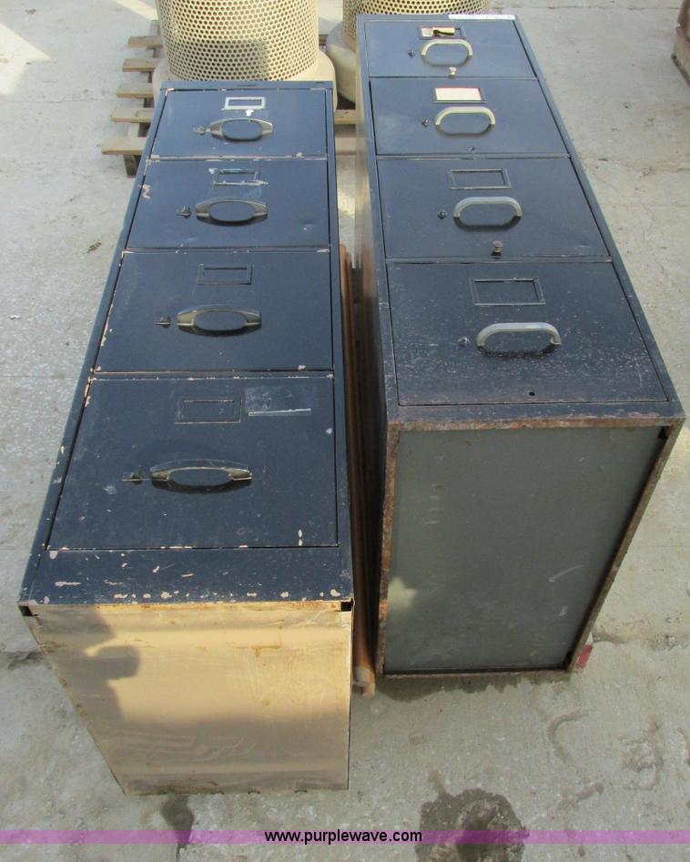 image for item V9061 (2) four drawer vertical file cabinets