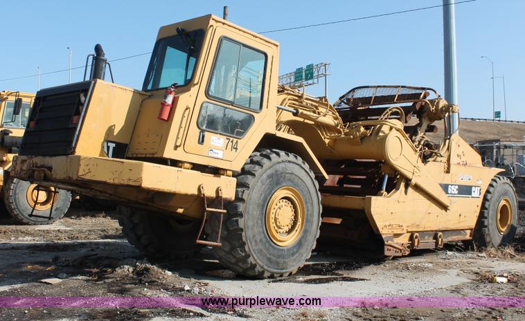 image for item E2813 2000 Caterpillar 615C paddle scraper