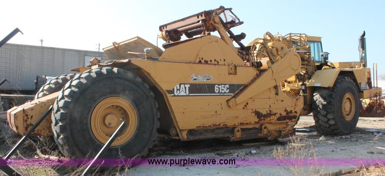 image for item E2813 2000 Caterpillar 615C paddle scraper