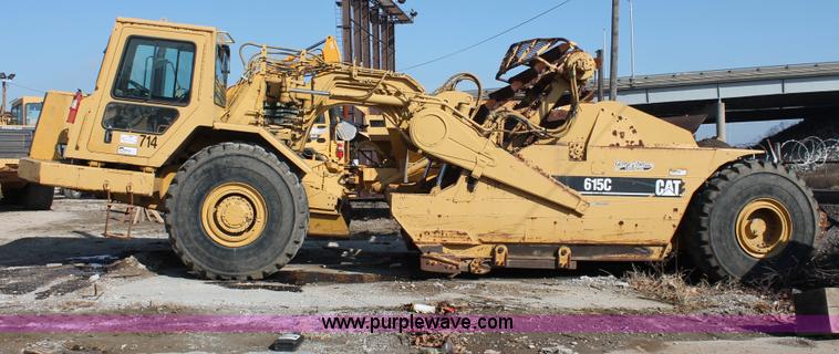 image for item E2813 2000 Caterpillar 615C paddle scraper