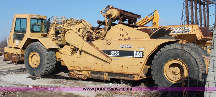 image for item E2813 2000 Caterpillar 615C paddle scraper