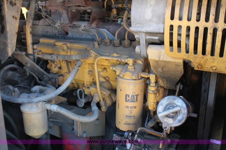 image for item E2813 2000 Caterpillar 615C paddle scraper