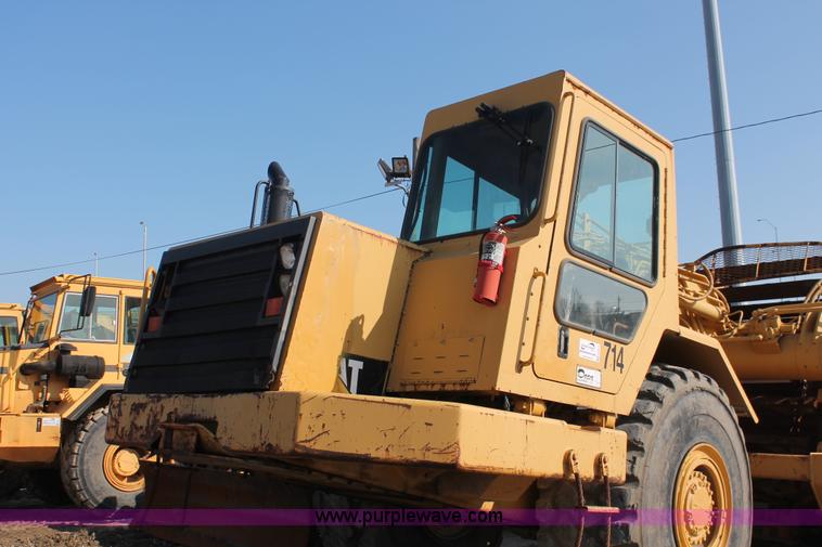 image for item E2813 2000 Caterpillar 615C paddle scraper