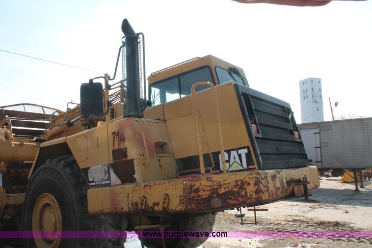 image for item E2813 2000 Caterpillar 615C paddle scraper