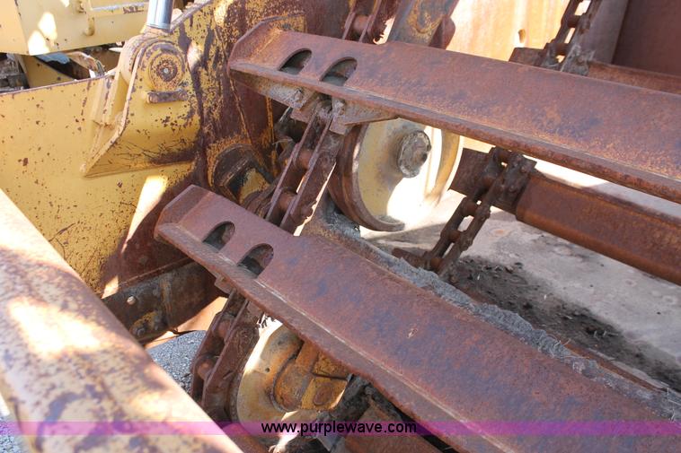 image for item E2813 2000 Caterpillar 615C paddle scraper