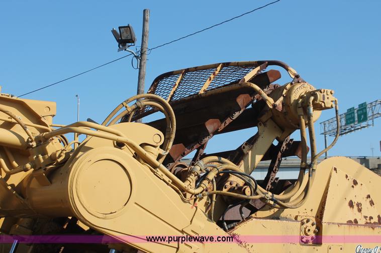 image for item E2813 2000 Caterpillar 615C paddle scraper