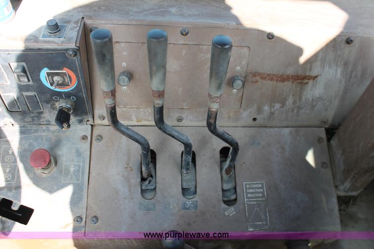 image for item E2814 1998 Caterpillar 615C paddle scraper