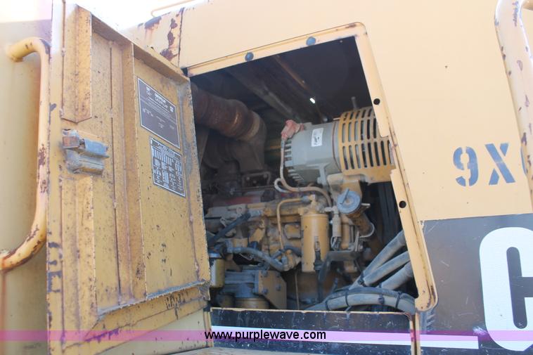 image for item E2814 1998 Caterpillar 615C paddle scraper