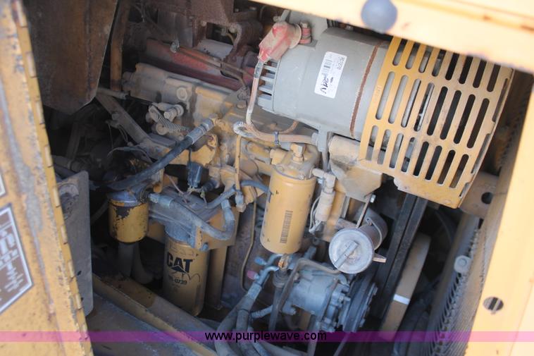 image for item E2814 1998 Caterpillar 615C paddle scraper