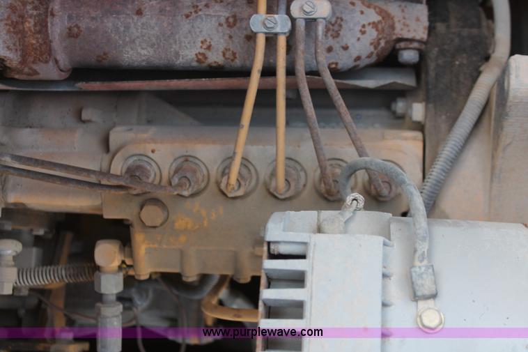 image for item E2814 1998 Caterpillar 615C paddle scraper