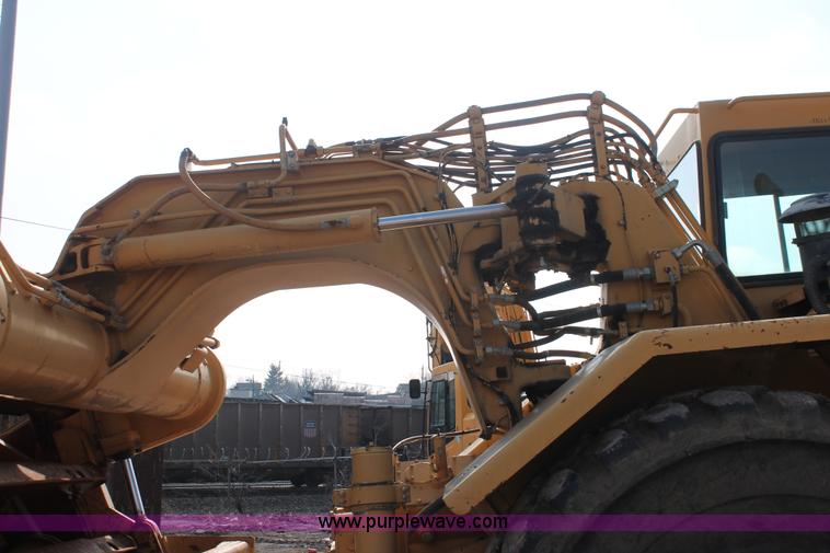 image for item E2814 1998 Caterpillar 615C paddle scraper