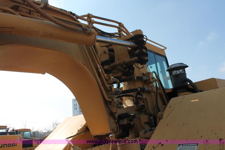 image for item E2814 1998 Caterpillar 615C paddle scraper