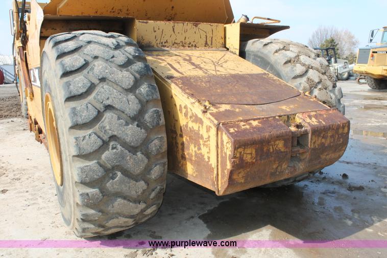 image for item E2814 1998 Caterpillar 615C paddle scraper