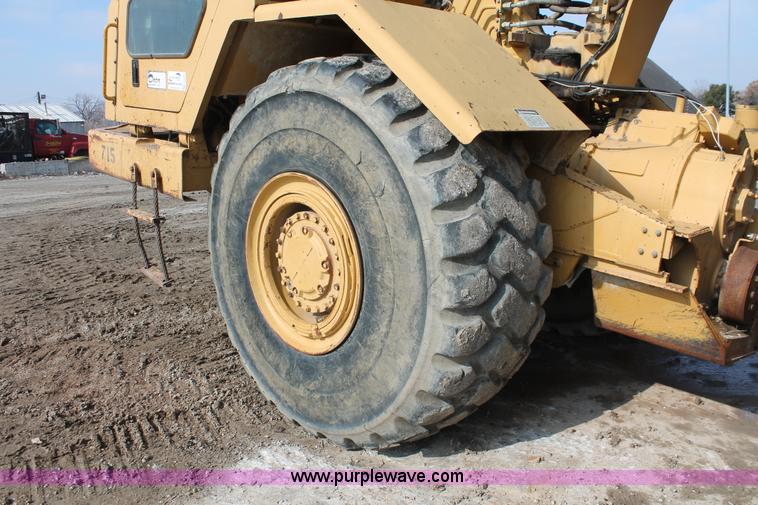 image for item E2814 1998 Caterpillar 615C paddle scraper