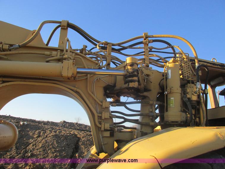 image for item F4300 1990 Caterpillar 621E wheel scraper