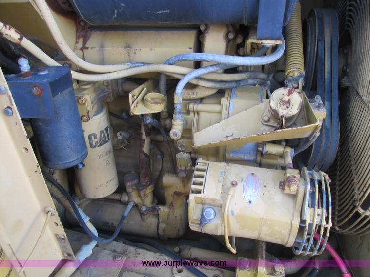 image for item F4300 1990 Caterpillar 621E wheel scraper