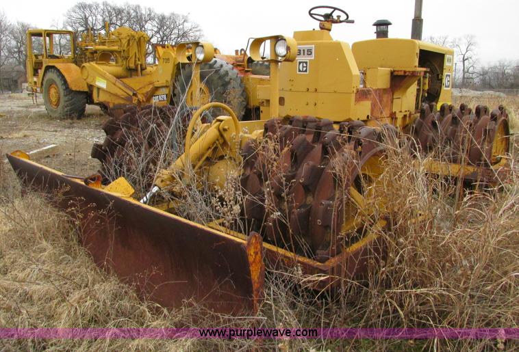 image for item F4311 Caterpillar 815 articulating soil compactor