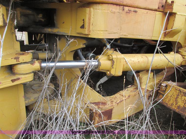 image for item F4311 Caterpillar 815 articulating soil compactor