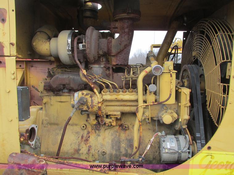 image for item F4311 Caterpillar 815 articulating soil compactor
