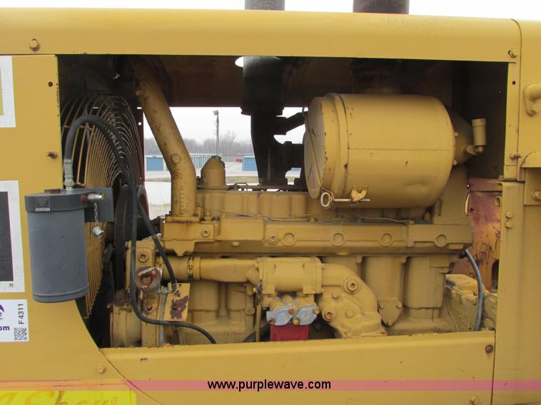 image for item F4311 Caterpillar 815 articulating soil compactor