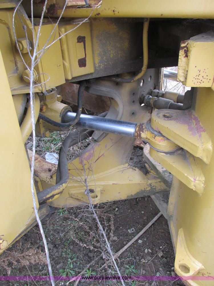 image for item F4311 Caterpillar 815 articulating soil compactor