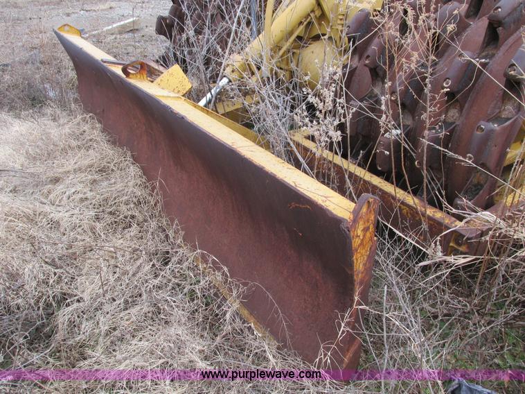 image for item F4311 Caterpillar 815 articulating soil compactor