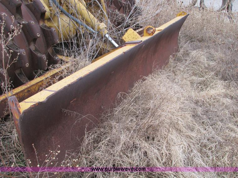 image for item F4311 Caterpillar 815 articulating soil compactor