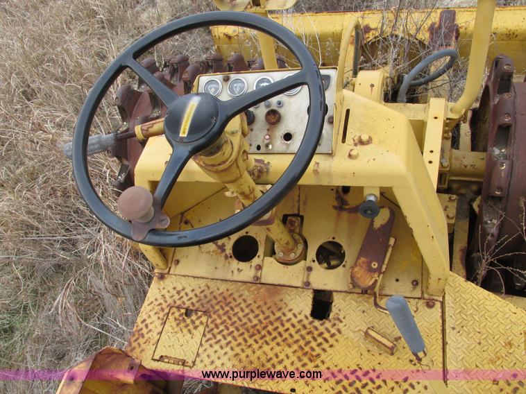 image for item F4311 Caterpillar 815 articulating soil compactor