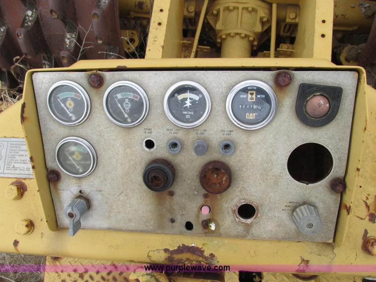 image for item F4311 Caterpillar 815 articulating soil compactor