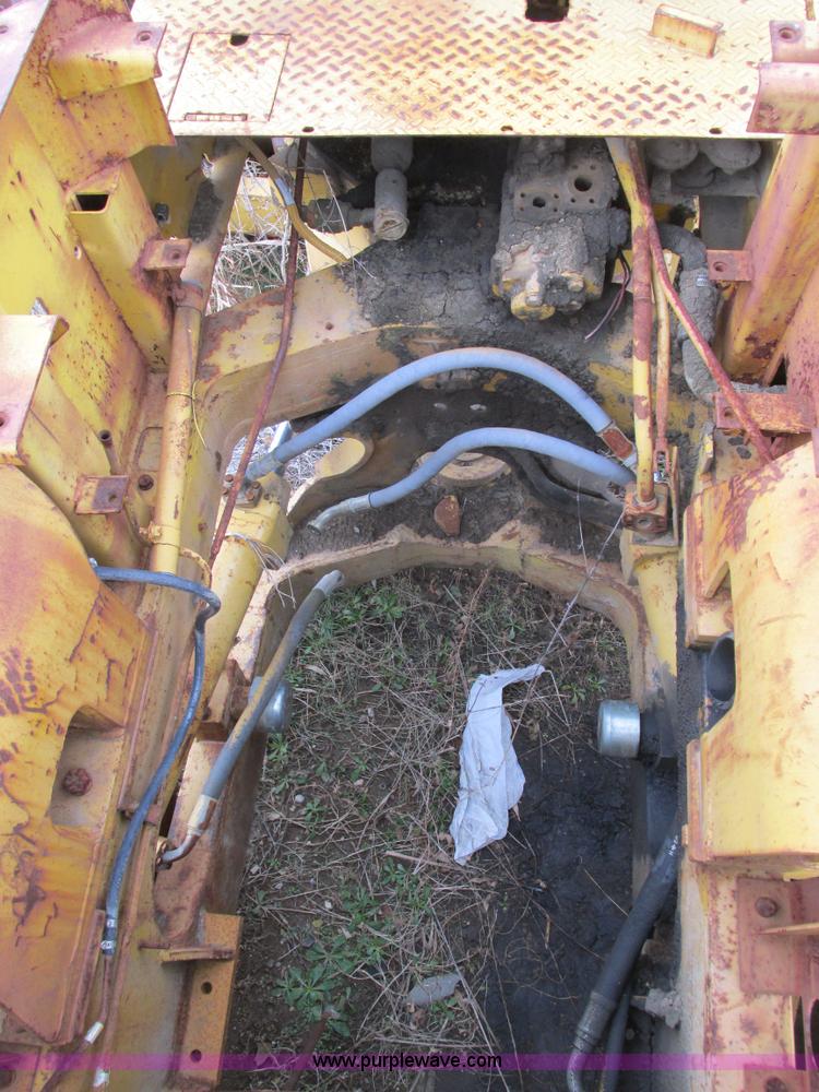 image for item F4311 Caterpillar 815 articulating soil compactor