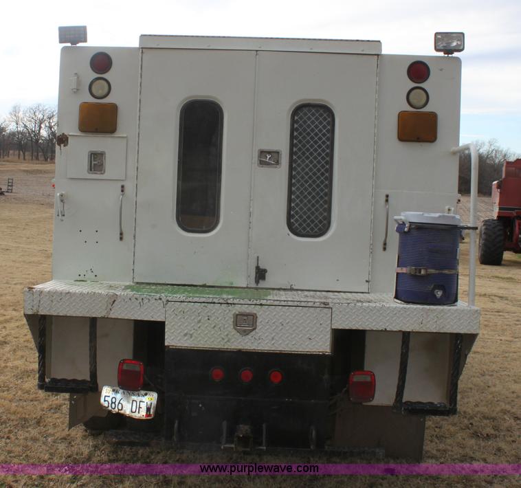 image for item E8415 1996 International 4700 Crew Cab service truck