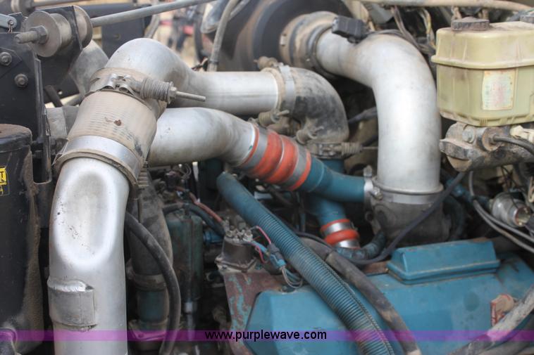 image for item E8415 1996 International 4700 Crew Cab service truck