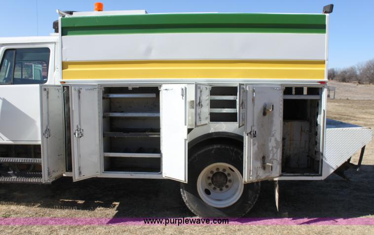 image for item E8415 1996 International 4700 Crew Cab service truck