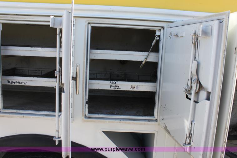 image for item E8415 1996 International 4700 Crew Cab service truck