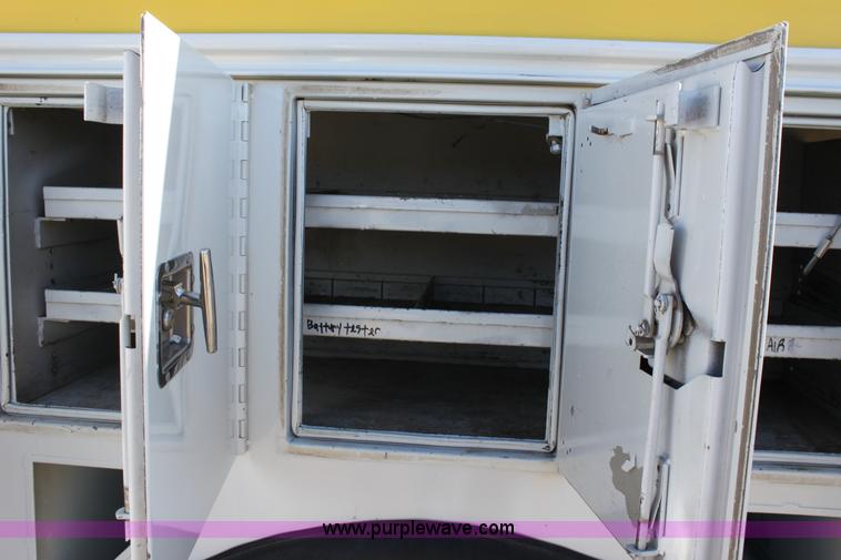 image for item E8415 1996 International 4700 Crew Cab service truck