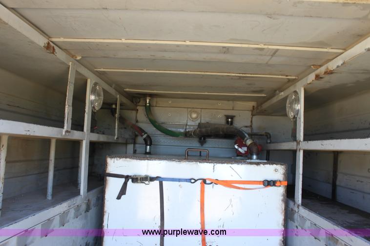 image for item E8415 1996 International 4700 Crew Cab service truck