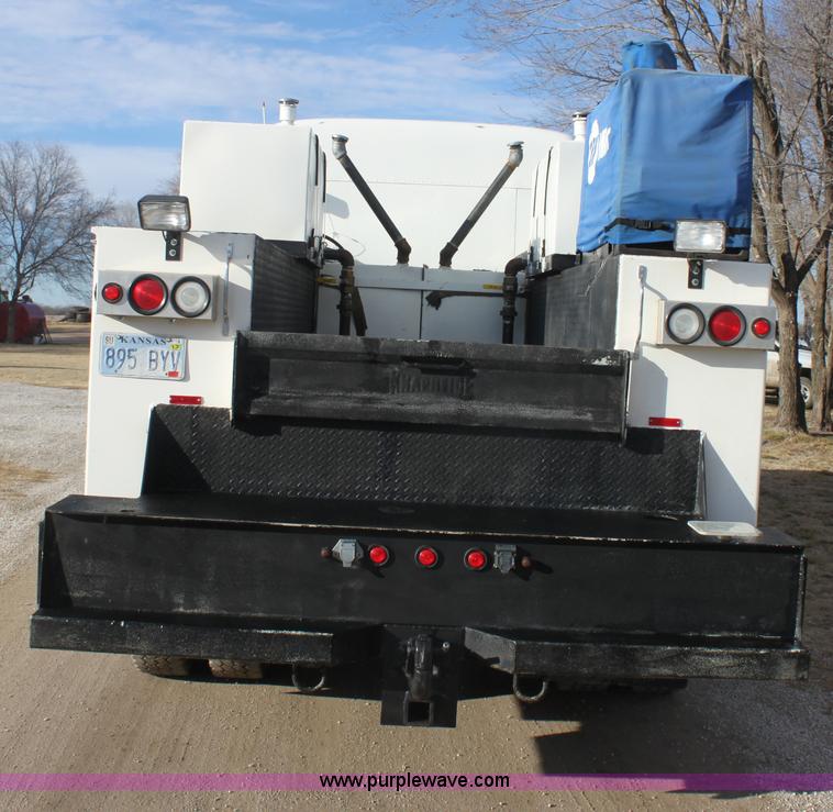 image for item E8416 1999 Freightliner FLD semi service truck