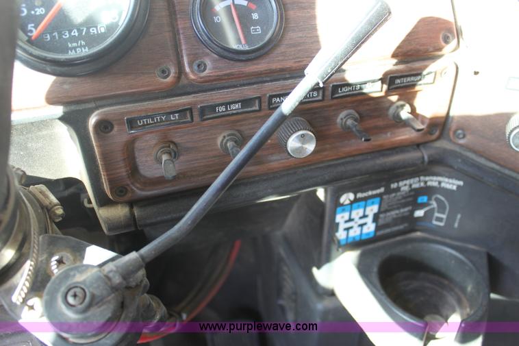 image for item E8416 1999 Freightliner FLD semi service truck