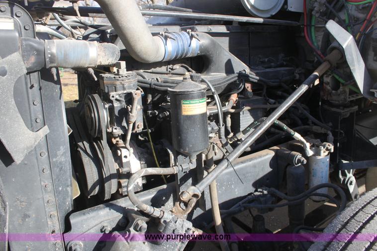 image for item E8416 1999 Freightliner FLD semi service truck