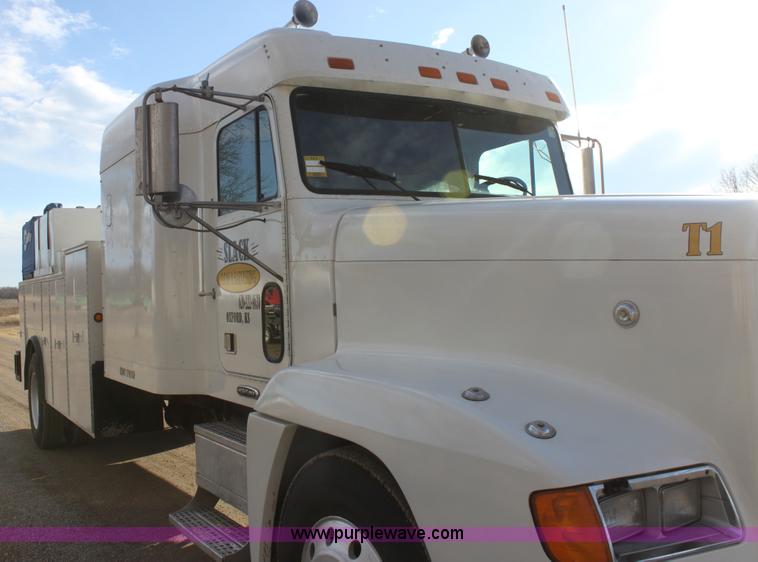 image for item E8416 1999 Freightliner FLD semi service truck