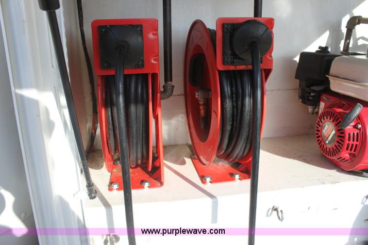 image for item E8416 1999 Freightliner FLD semi service truck