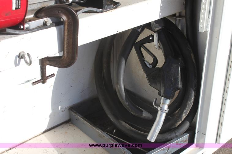 image for item E8416 1999 Freightliner FLD semi service truck