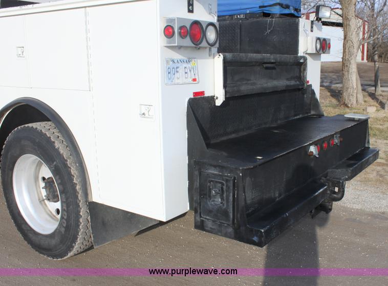 image for item E8416 1999 Freightliner FLD semi service truck