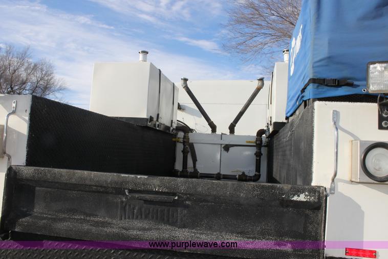 image for item E8416 1999 Freightliner FLD semi service truck