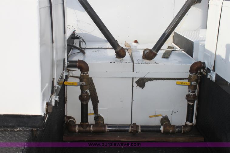 image for item E8416 1999 Freightliner FLD semi service truck