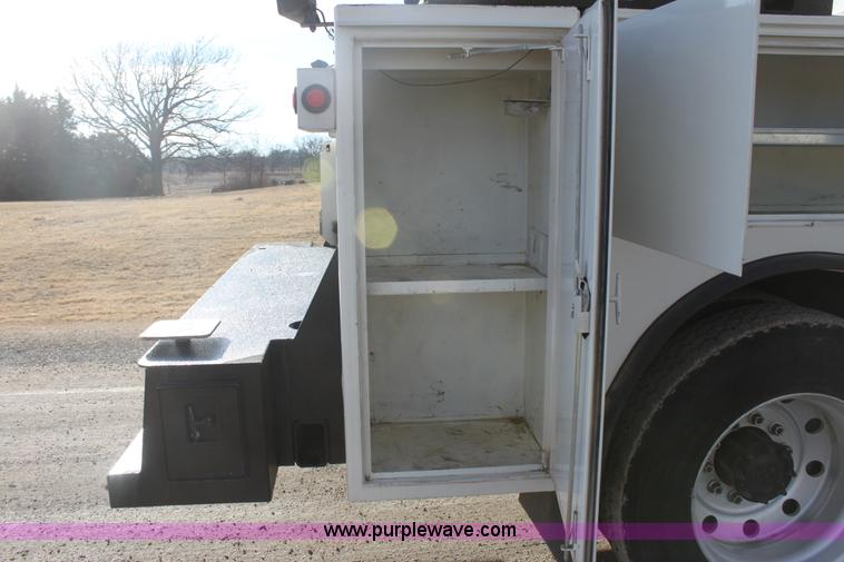 image for item E8416 1999 Freightliner FLD semi service truck