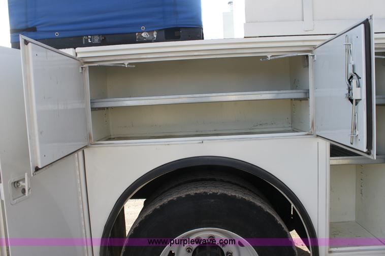 image for item E8416 1999 Freightliner FLD semi service truck