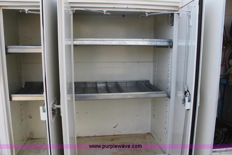 image for item E8416 1999 Freightliner FLD semi service truck